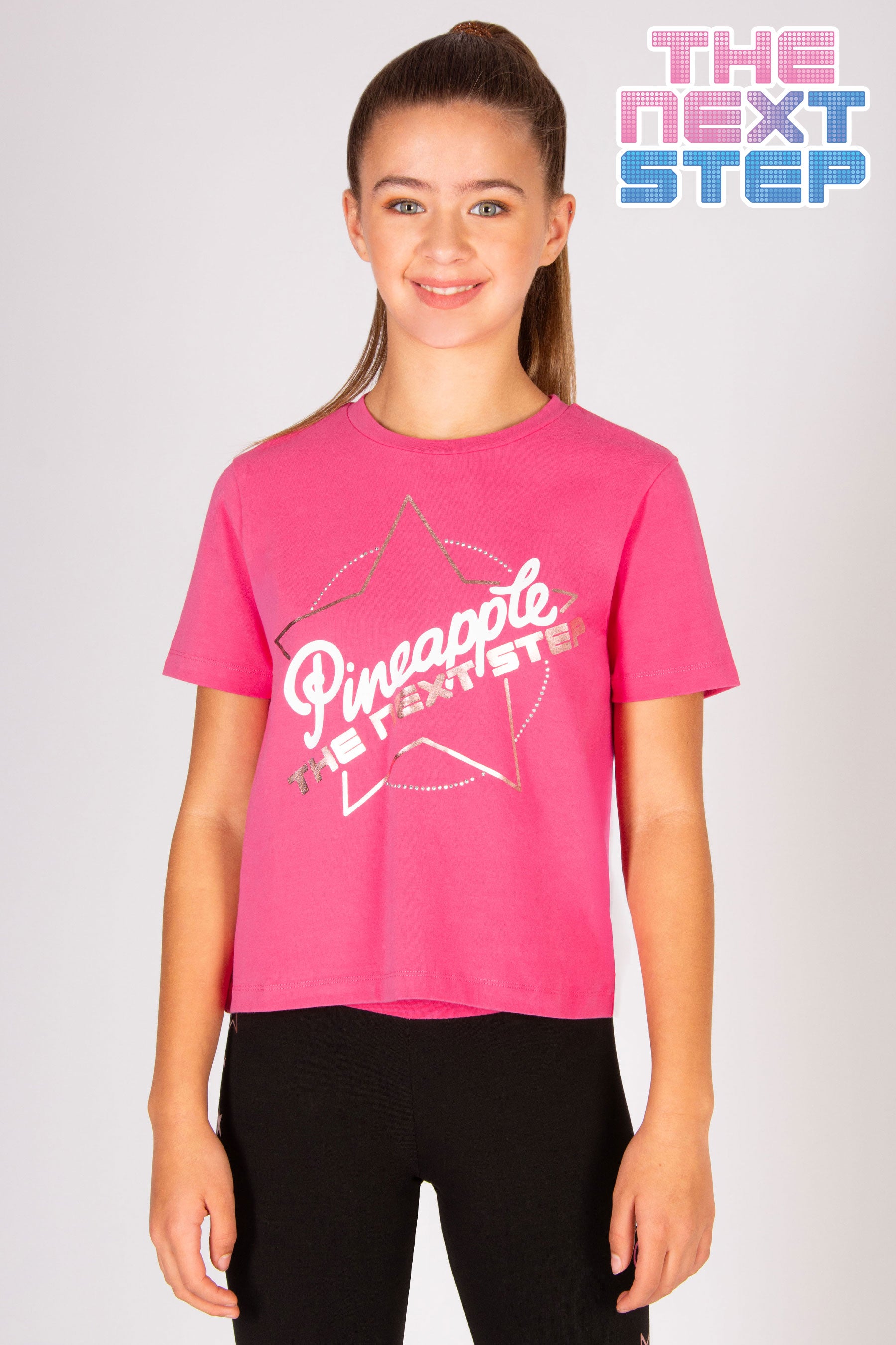 Pink The Next Step dance t-shirt for girls decorated with rhinestones.