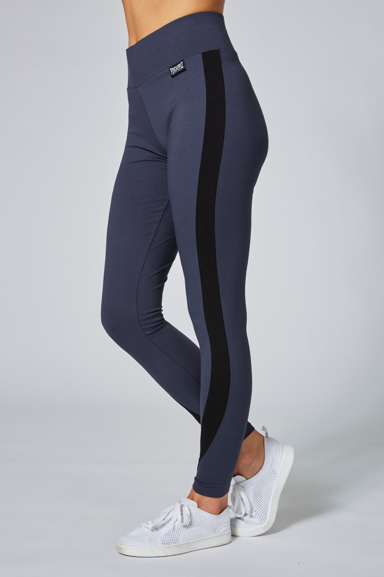 Woman wearing Pineapple Charcoal Racer Legging