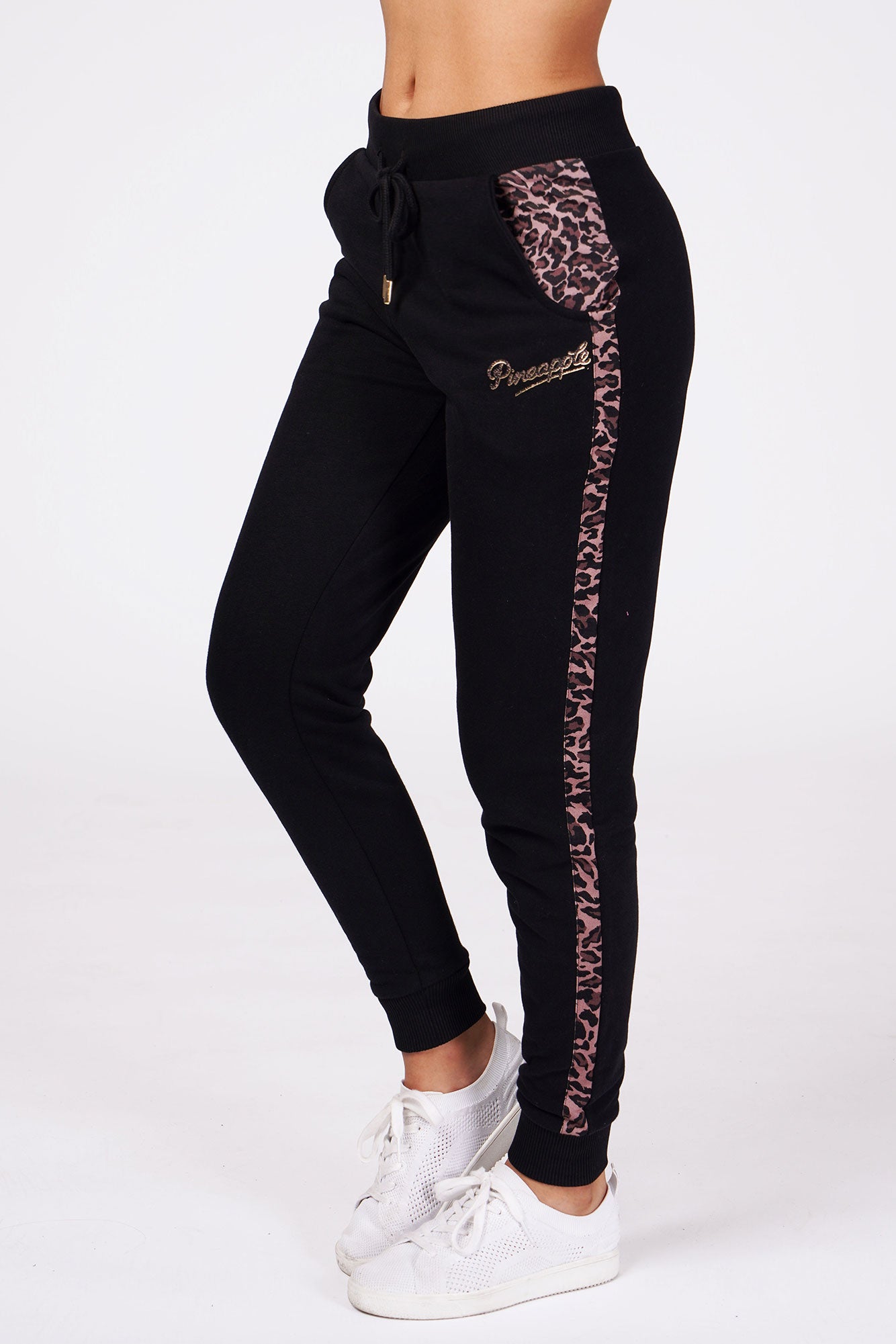 Woman wearing Pineapple Black Leopard Stripe Joggers