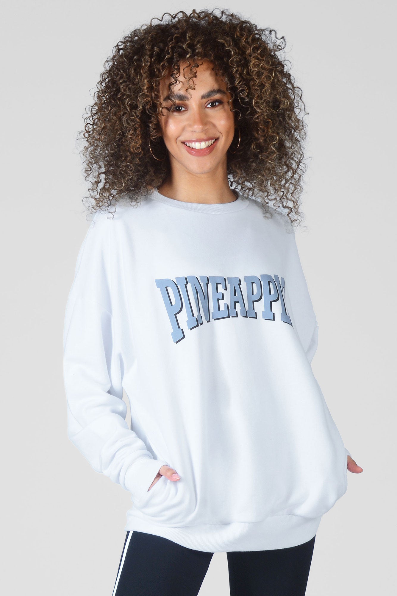 Woman wearing Pineapple white Oversized Logo Sweat Top