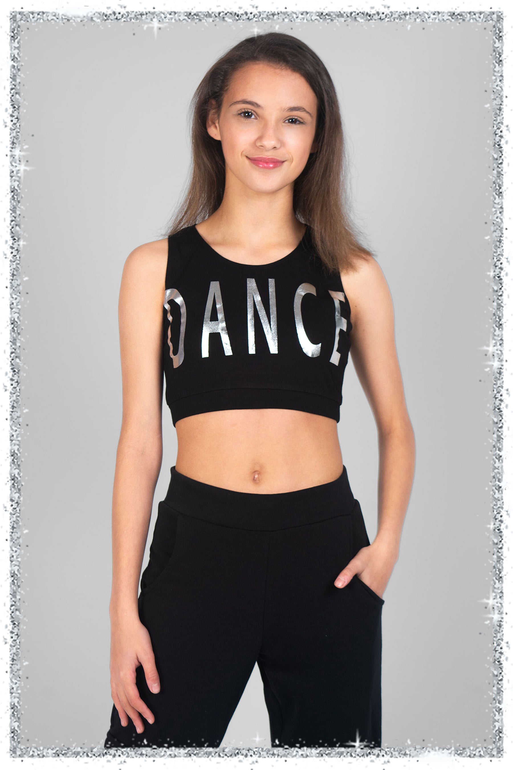 Person wearing a black 'DANCE' crop top on a gray background