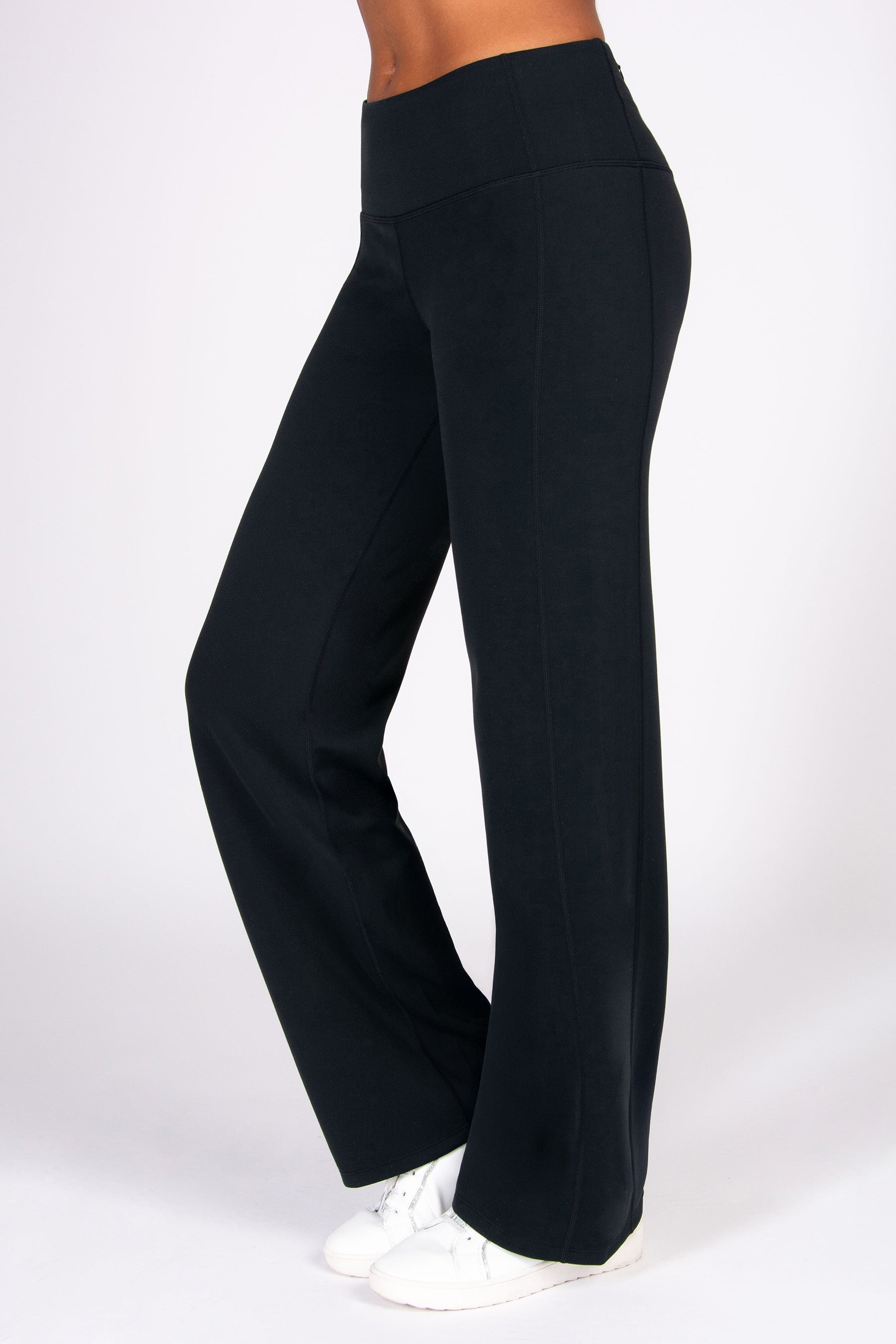 Black super soft wide-leg yoga pants worn by a person on a white background