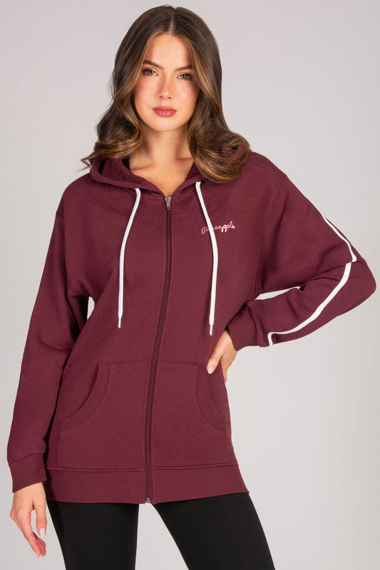 Maroon hoodie with white trim and pockets worn by Kianna Louise  on a grey background