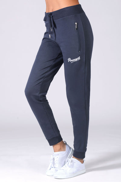 Women's Skinny Zip Joggers in dark grey colour featuring a zip pocket and adjustable drawstring