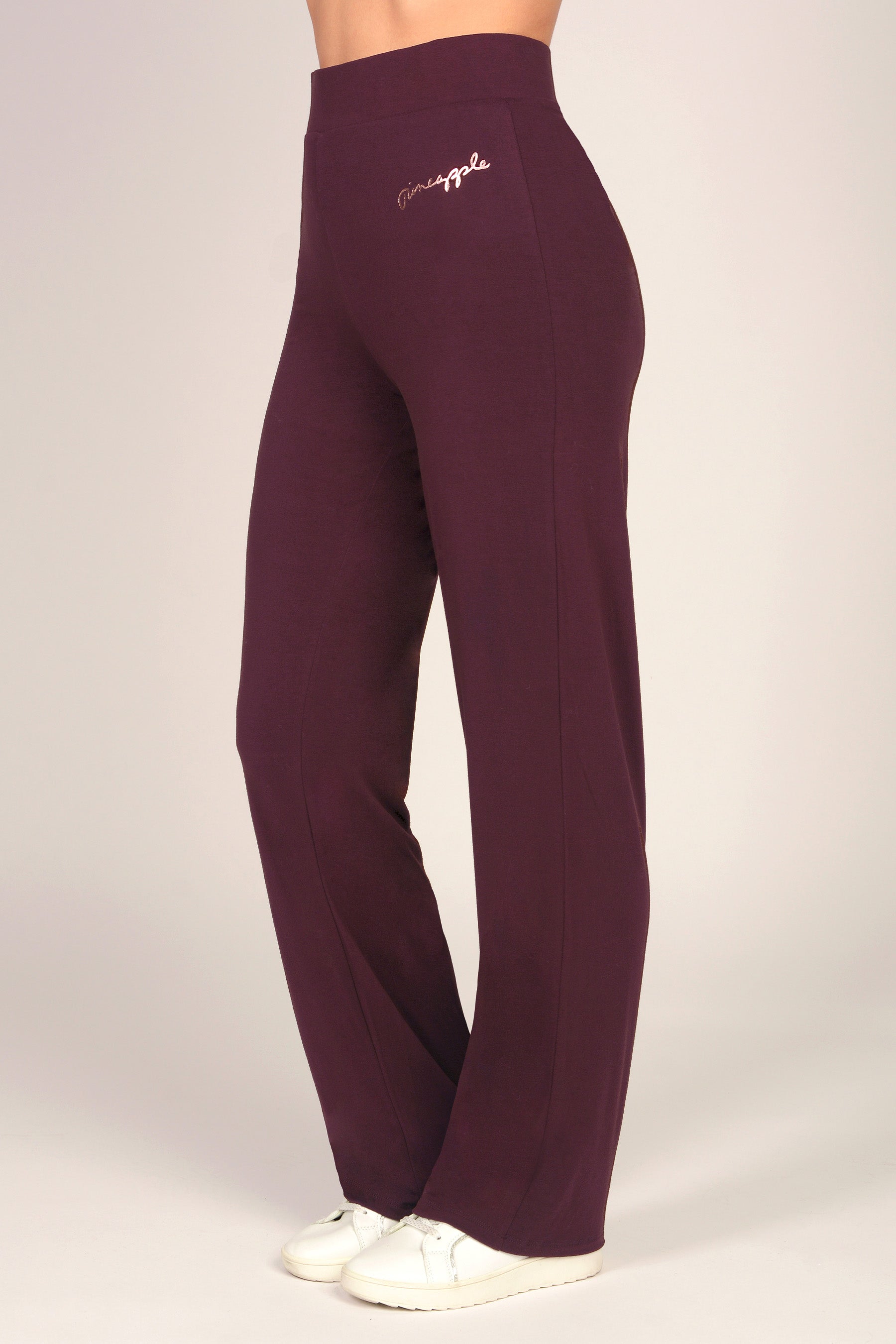 Women's maroon brown viscose jersey trousers on a white background
