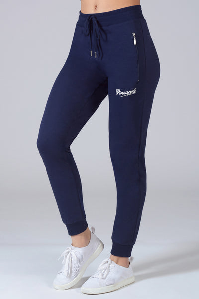 women's dark navy skinny joggers with zip pockets and drawstring waistband