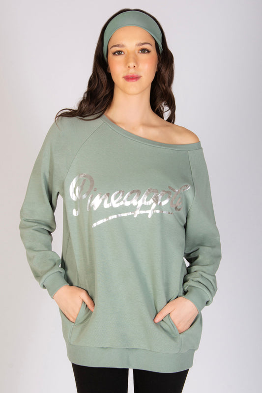 Martyna Balsam wearing sage off shoulder sweatshirts with matching headband