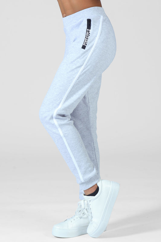 Girl wearing Pineapple grey Joggers with white stripe