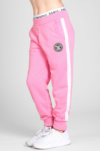 Girl wearing Pineapple pink Mesh Slim Track Pants