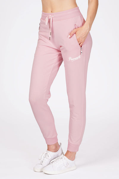 Woman wearing Pineapple Skinny Zip Pink Trousers